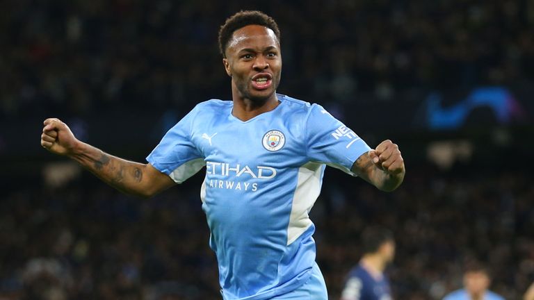 Man City's Raheem Sterling celebrates after scoring against PSG