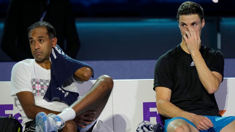 Rajeev Ram of the United States and Britain's Joe Salisbury, right, react after losing to France's Pierre-Hugues Herbert and Nicolas Mahut in the doubles final tennis match of the ATP World Tour Finals, at the Pala Alpitour in Turin, Italy, Sunday, Nov. 21, 2021. Herbert and Mahut won 6-4/7-6. (AP Photo/Luca Bruno)