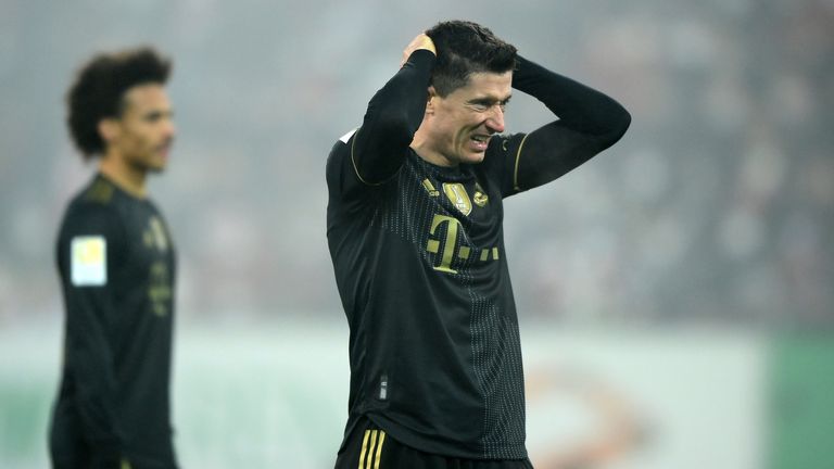 Robert Lewandowski reacts during Bayern's defeat in Augsburg