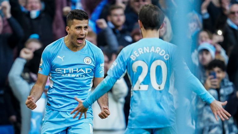 Man City&#39;s Rodri celebrates after scoring against Everton