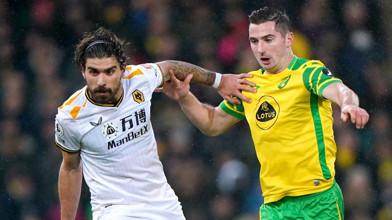 Ruben Neves and Kenny McLean in action at Carrow Road