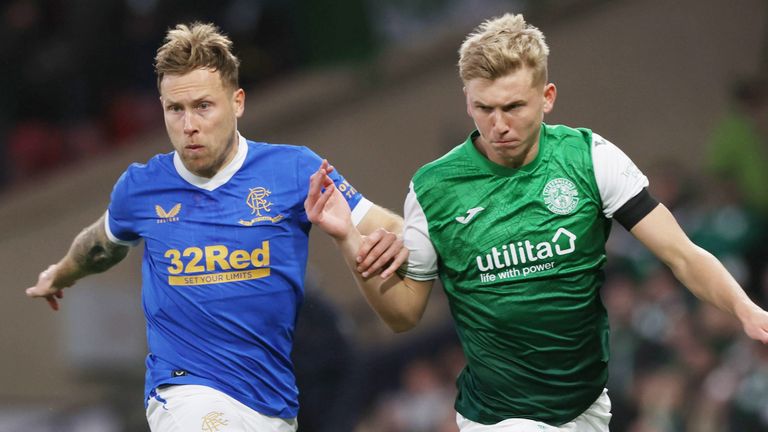 Rangers' Scott Arfield tussles with Hibernian's Josh Doig in Scottish League Cup semi-final