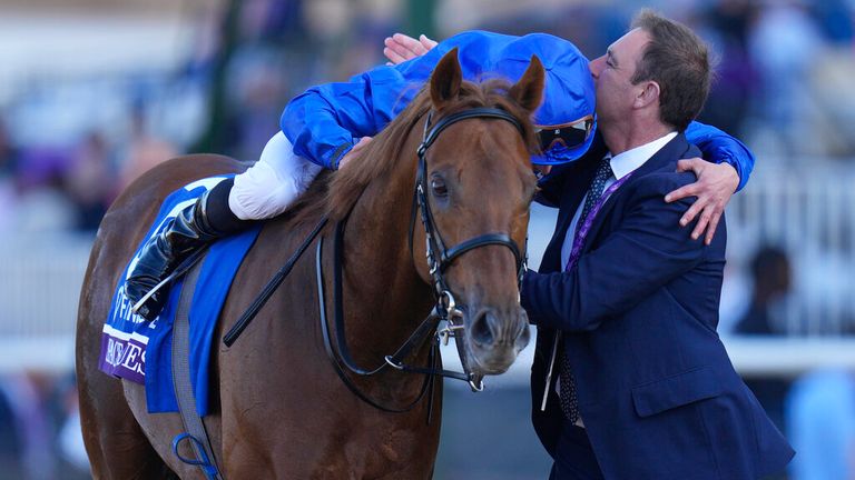 Charlie Appleby and William Buick embrace after winning the Breeders&#39; Cup Mile