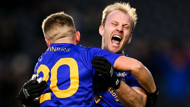 Former Cork star  Michael Shields celebrates with Bill O'Connell at full-time