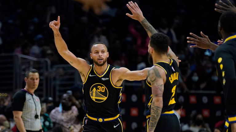 Golden State Warriors guard Stephen Curry celebrates after making a three-pointer against the Los Angeles Clippers