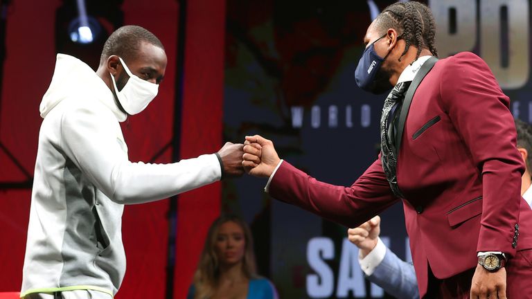 LAS VEGAS, NEVADA - NOVEMBER 17: WBO welterweight champion Terence Crawford (L) and Shawn Porter (R) bump fist during the press conference at Islander Ballroom at Mandalay Bay Hotel & Casino on November 17, 2021 in Las Vegas, Nevada. (Photo by Mikey Williams/Top Rank Inc via Getty Images).