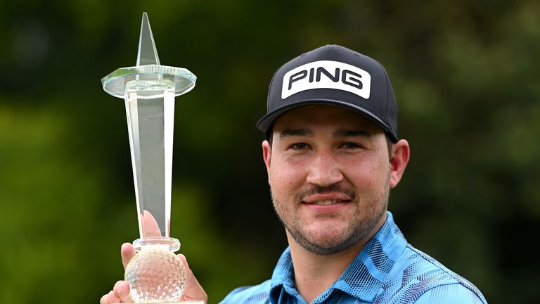 South Africa's Thriston Lawrence celebrates after winning the Joburg Open at Randpark Golf Club