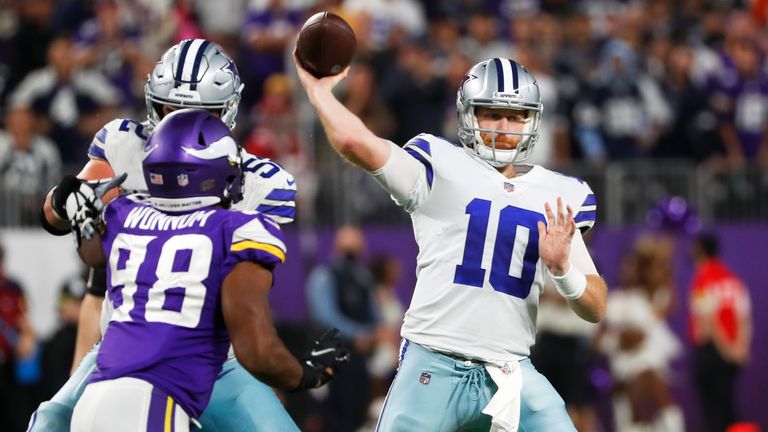 Dallas Cowboys quarterback Cooper Rush throws a pass against the Minnesota Vikings