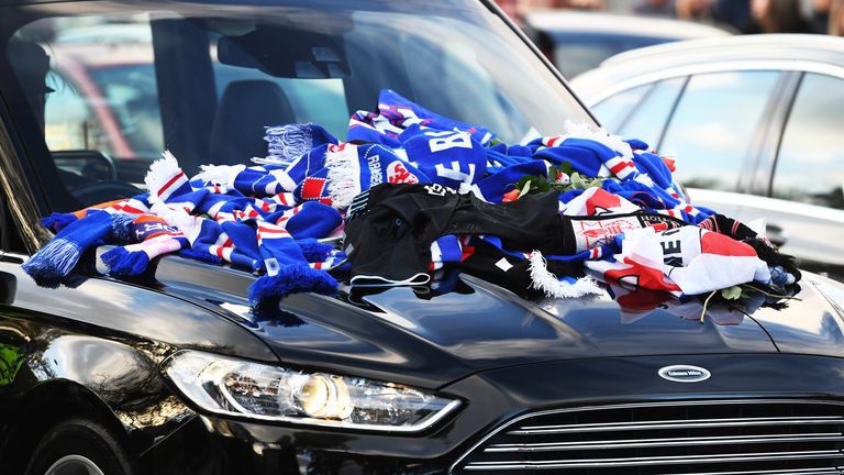 Former Rangers manager Walter Smith&#39;s funeral cortege passes Ibrox Stadium