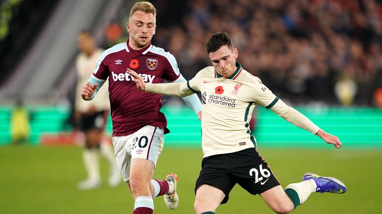 West Ham United&#39;s Jarrod Bowen (left) and Liverpool&#39;s Andrew Robertson battle for the ball during the Premier League match at the London Stadium, London. Picture date: Sunday November 7, 2021.