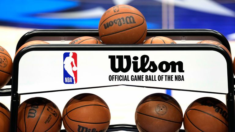 The NBA logo is seen along with the Wilson name and basketballs at American Airlines Center
