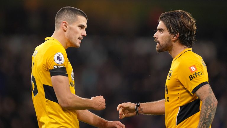 Ruben Neves and Conor Coady celebrate at the final whistle