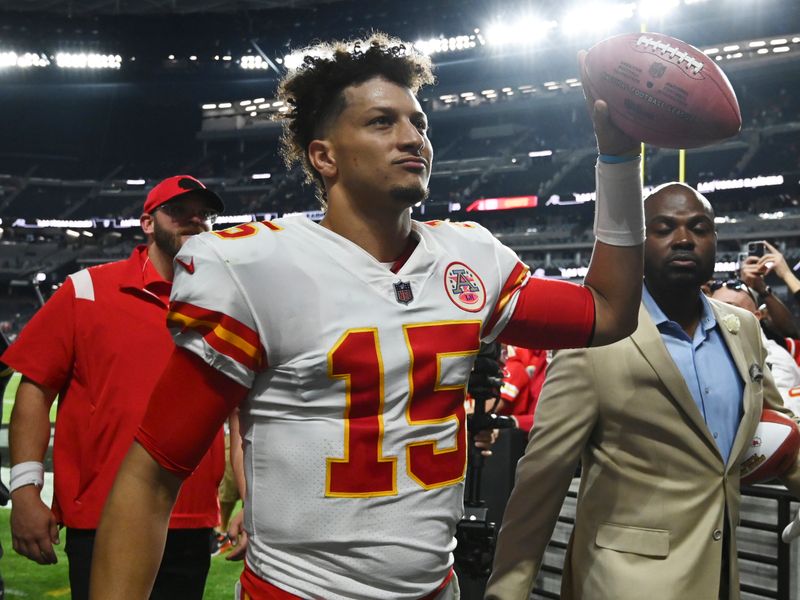 Kansas City Chiefs quarterback Patrick Mahomes, left, passes before Los  Angeles Chargers linebacker Kyle Van Noy can get to him during the second  half of an NFL football game Sunday, Nov. 20