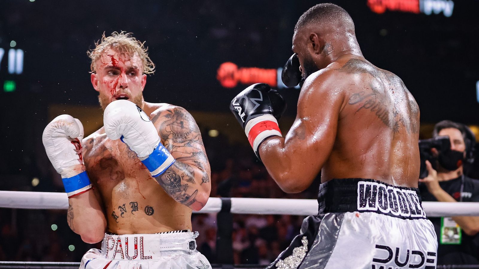 Jake Paul emphatically knocks out Tyron Woodley in sixth round of