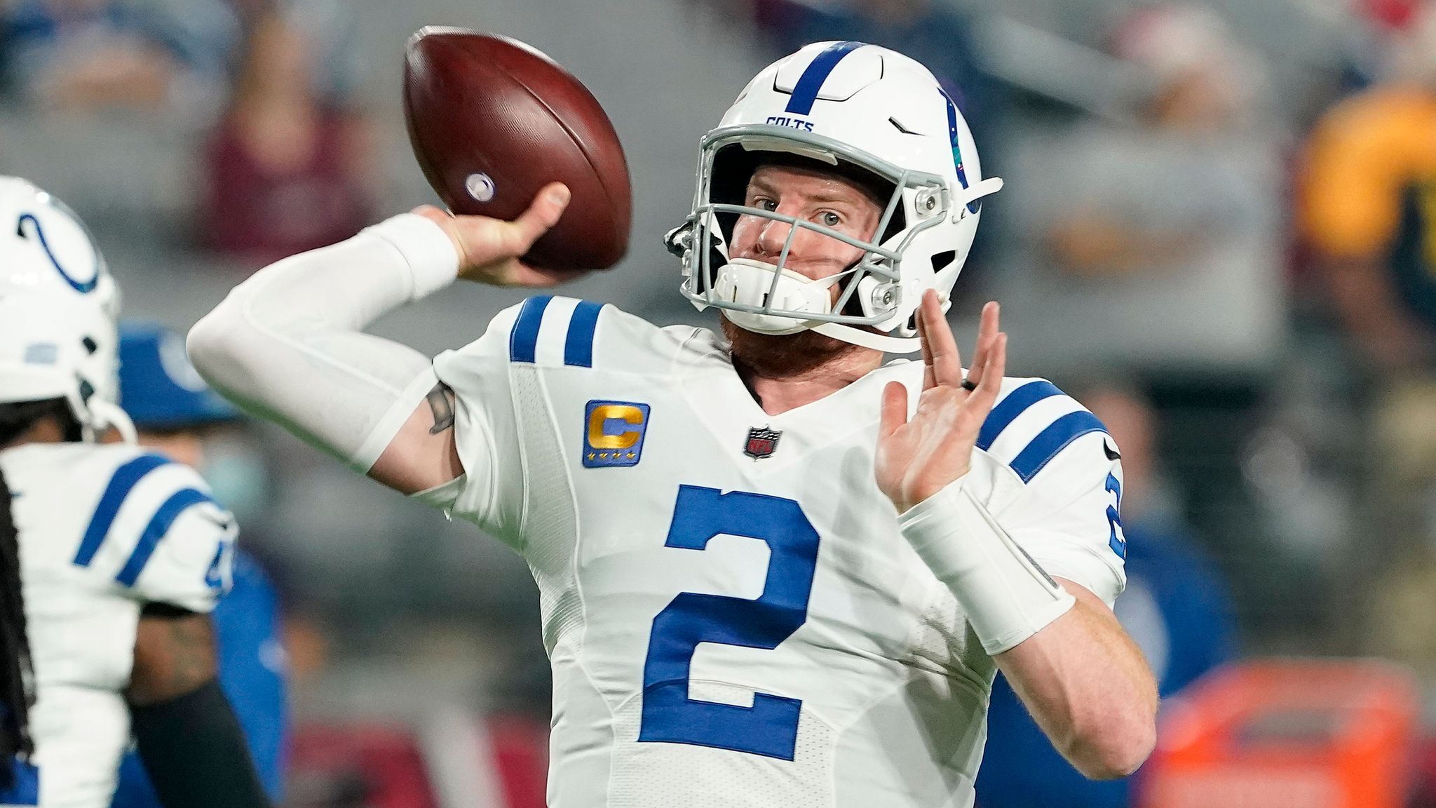 FILE - Indianapolis Colts quarterback Carson Wentz (2) scrambles for  yardage during the first half of an NFL football game against the  Jacksonville Jaguars, Sunday, Jan. 9, 2022, in Jacksonville, Fla. The