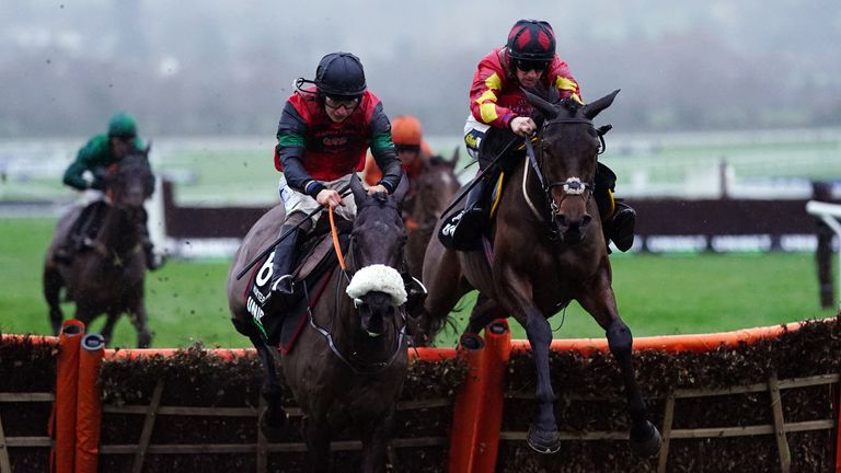 Guard Your Dreams (right) ridden by Sam Twiston-Davies on way to winning the Unibet International Hurdle