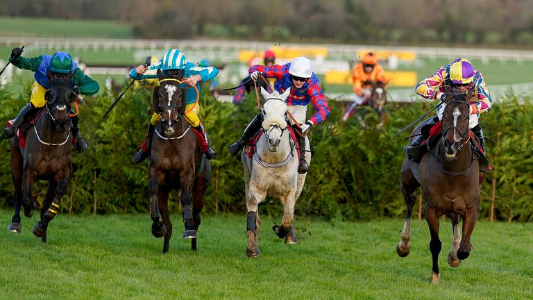 Harry Bannister riding Diesel D'Allier (grey horse) to victory at Cheltenham