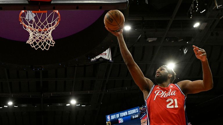 Philadelphia 76ers center Joel Embiid goes to the basket against the Washington Wizards