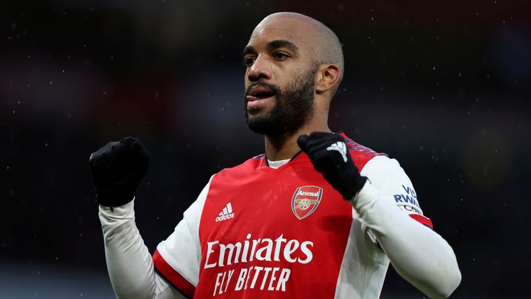 Alexandre Lacazette celebrates after giving Arsenal the lead (AP)