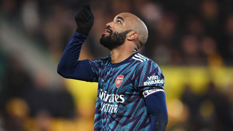 Alexandre Lacazette gestures after converting his penalty for 3-0