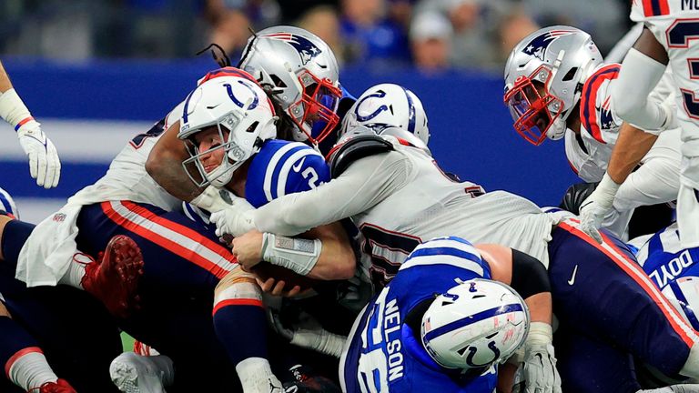 The best of the action from the clash between the New England Patriots and the Indianapolis Colts in Week 15 of the NFL season.