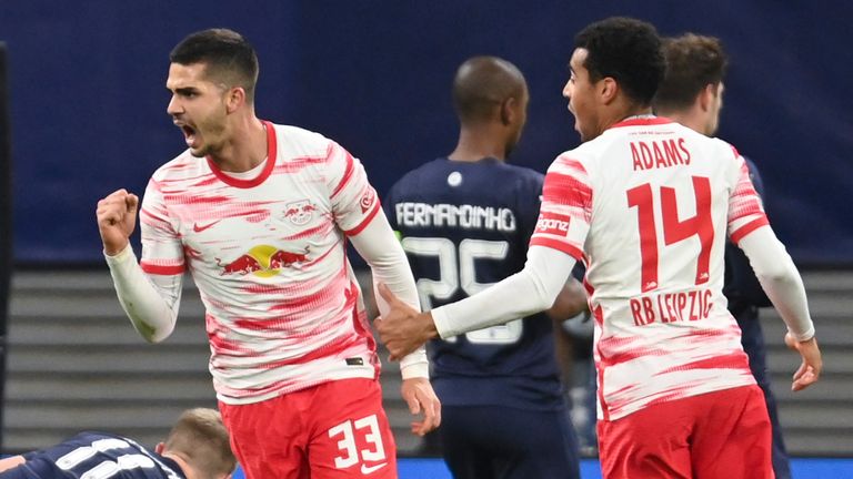 Andre Silva celebrates after doubling RB Leipzig's lead against Man City