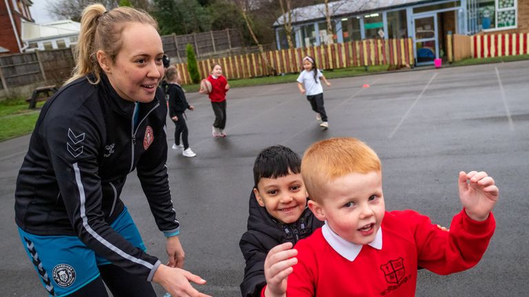 Anna Mary Davies takes part in a Warriors Unite session at St Benedict's Primary School
