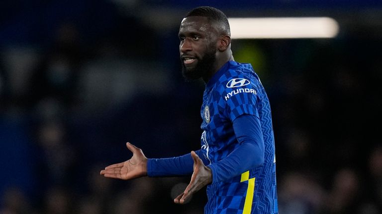 Antonio Rudiger argues with referee Mike Dean