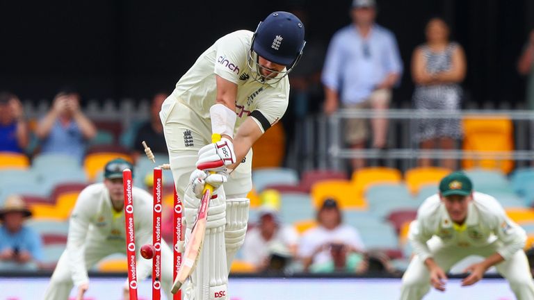 Rory Burns was bowled around his legs by Mitchell Starc's first ball in Brisbane
