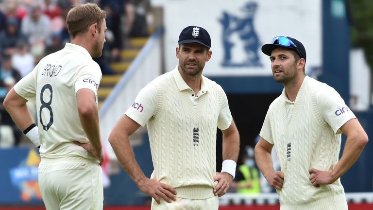 England's Mark Wood, right, James Anderson and Stuart Broad, left, during the second day of the 2nd Test match between England and New Zealand at Edgbaston cricket ground in Birmingham, England, Friday, June 11, 2021. (AP Photo/Rui Vieira)..