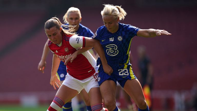 Chelsea's Pernille Harder and Arsenal's Noelle Maritz (left) compete for the ball during the Women's FA Super Cup match at the Emirates Stadium