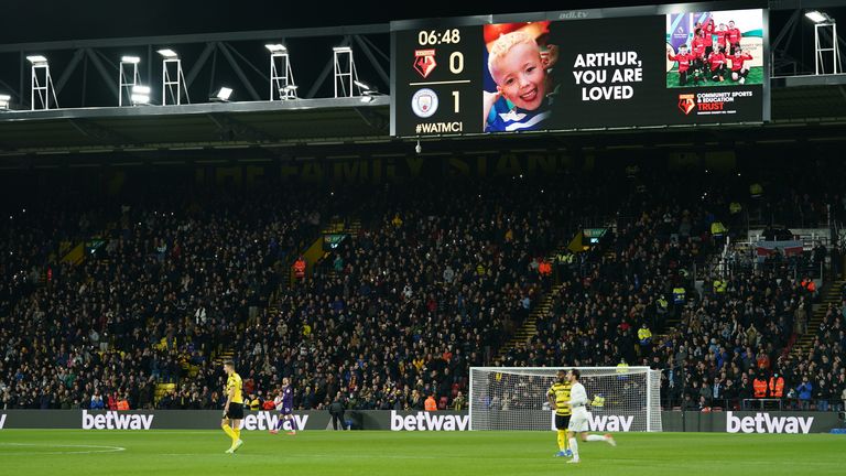 A tribute to Arthur Labinjo-Hughes is shown during the Premier League match at Vicarage Road, Watford. Picture date: Saturday December 4, 2021.