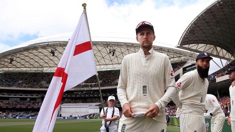 England captain Joe Root (holding flag) prepares for his side's Ashes Test against Australia in Adelaide in 2017