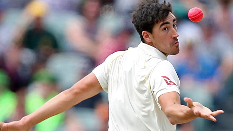 In this Dec. 4, 2017, file photo, Australia's Mitchell Starc reaches out to take the wicket of England's Jonny Bairstow, caught and bowled for 21 runs, during their Ashes cricket test match in Adelaide, Australia. Starc hasn't picked up a cricket bat or ball in two months, and isn't exactly salivating at the prospect of going back to work. (AP Photo/Rick Rycroft, File)