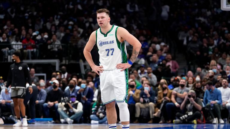 Luka Doncic somehow beat the shot clock with an incredible three as Dallas went into half-time with a 12-point lead over Brooklyn.