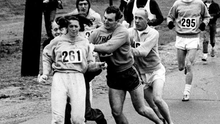 Switzer's boyfriend who was an American football player barges Semple away so they can continue running