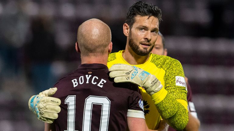 EDINBURGH, SCOTLAND - JULY 31: Hearts' Liam Boyce (left) and full-time Craig Gordon during a Championship match between Hearts and Celtic at Tynecastle Park on July 31, 2021, in Edinburgh, Scotland.  (Photo by Ross Parker / SNS Group)