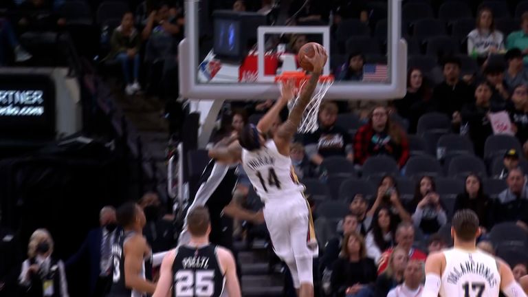 Pelicans' Brandon Ingram puts Doug McDermott in a poster.