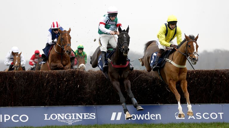 Brave Seasca and Gavin Sheehan clear a fence alongside Amarillo Sky at Ascot