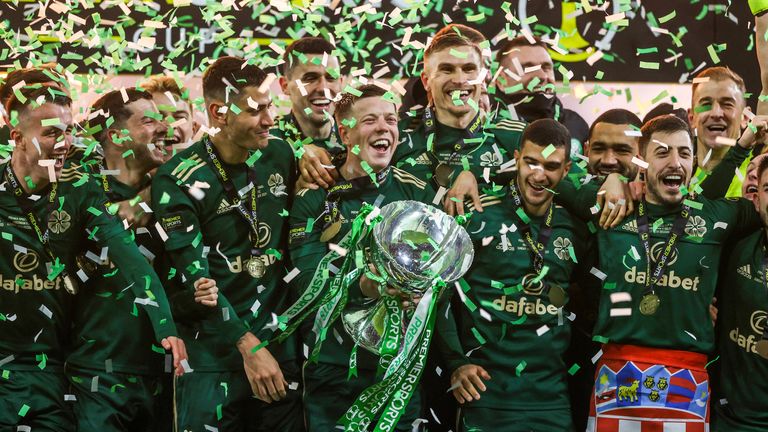 Celtic Captain Callum McGregor lifts the League Cup trophy