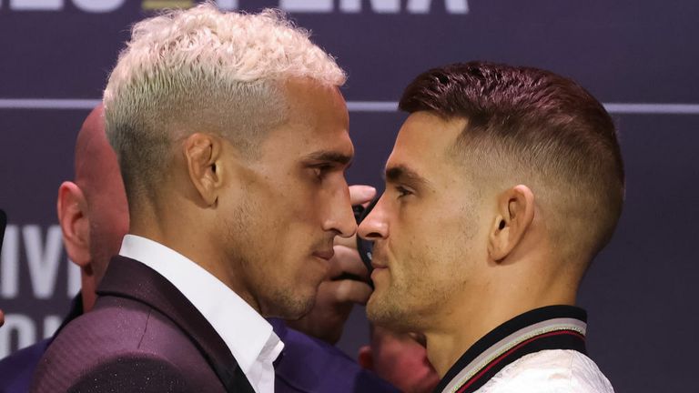 Charles Oliveira of Brazil and Dustin Poirier face off during the UFC 269 press conference at MGM Grand Garden Arena on December 09, 2021 in Las Vegas, Nevada. (Photo by Carmen Mandato/Getty Images)
