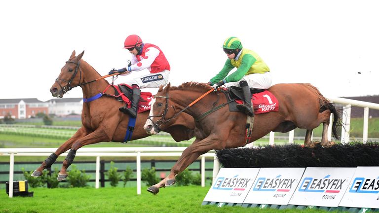 Colonel Mustard and Conor Orr (far) jump the last to win the Corrib Oil Maiden Hurdle from Champagne Vacation at Galway