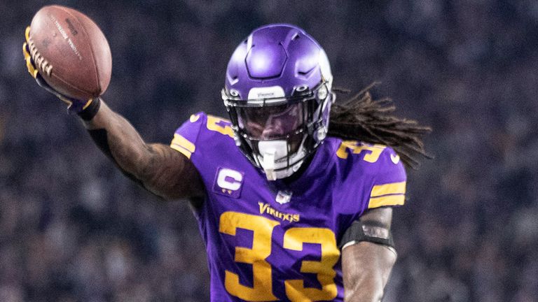 Minnesota Vikings running back Dalvin Cook leaps into the endzone to celebrate one of his two touchdown runs