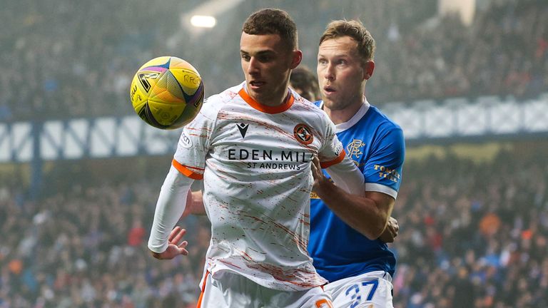 Darren Watson and Scott Arfield in action during a cinch Premiership match between Rangers and Dundee United at Ibrox Stadium