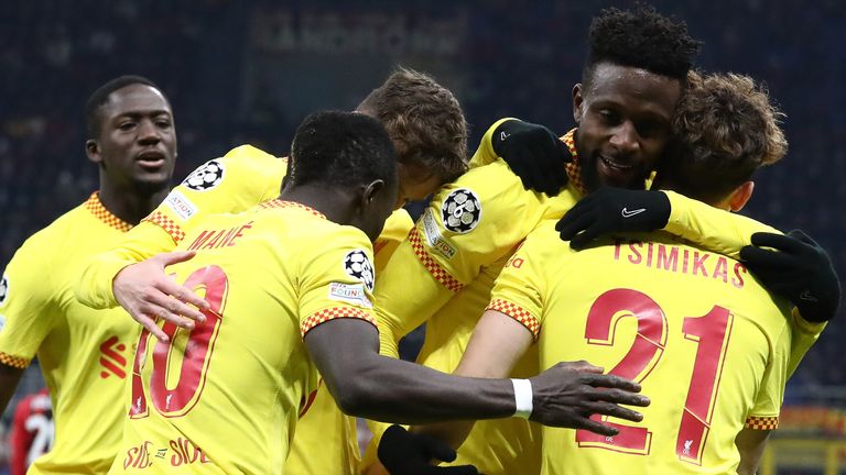 Divock Origi celebrates with team-mates after putting Liverpool 2-1 up in Milan