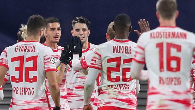 RB Leipzig players celebrate after Dominik Szoboszlai gave them the lead against Man City