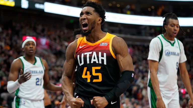 Utah Jazz guard Donovan Mitchell reacts after scoring against the Dallas Mavericks