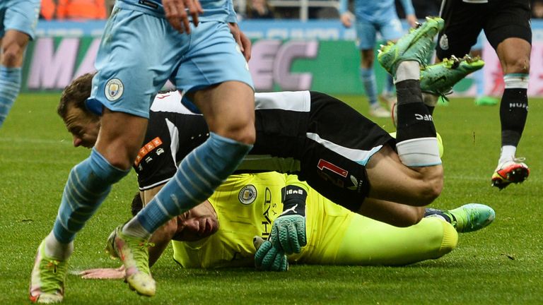 Ederson takes out Ryan Fraser and no foul given as play continues
