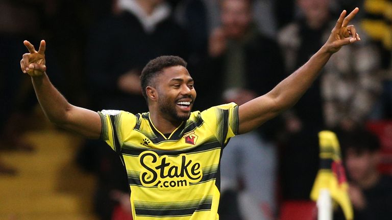 Watford&#39;s Emmanuel Dennis celebrates scoring against West Ham