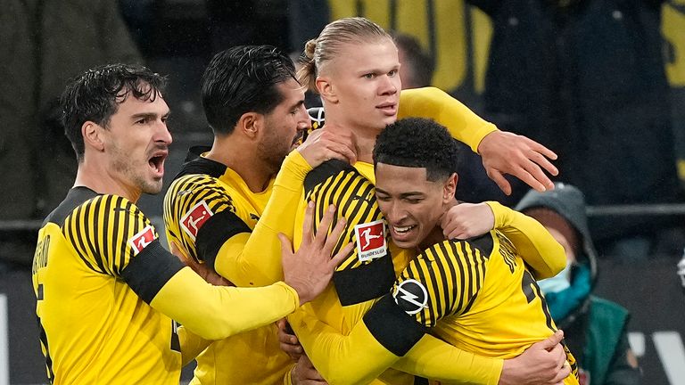 Dortmund&#39;s Erling Haaland, center, celebrates with teammates after scoring his side&#39;s second goal during the German Bundesliga soccer match between Borussia Dortmund and Bayern Munich in Dortmund, Germany, Saturday, Dec. 4, 2021